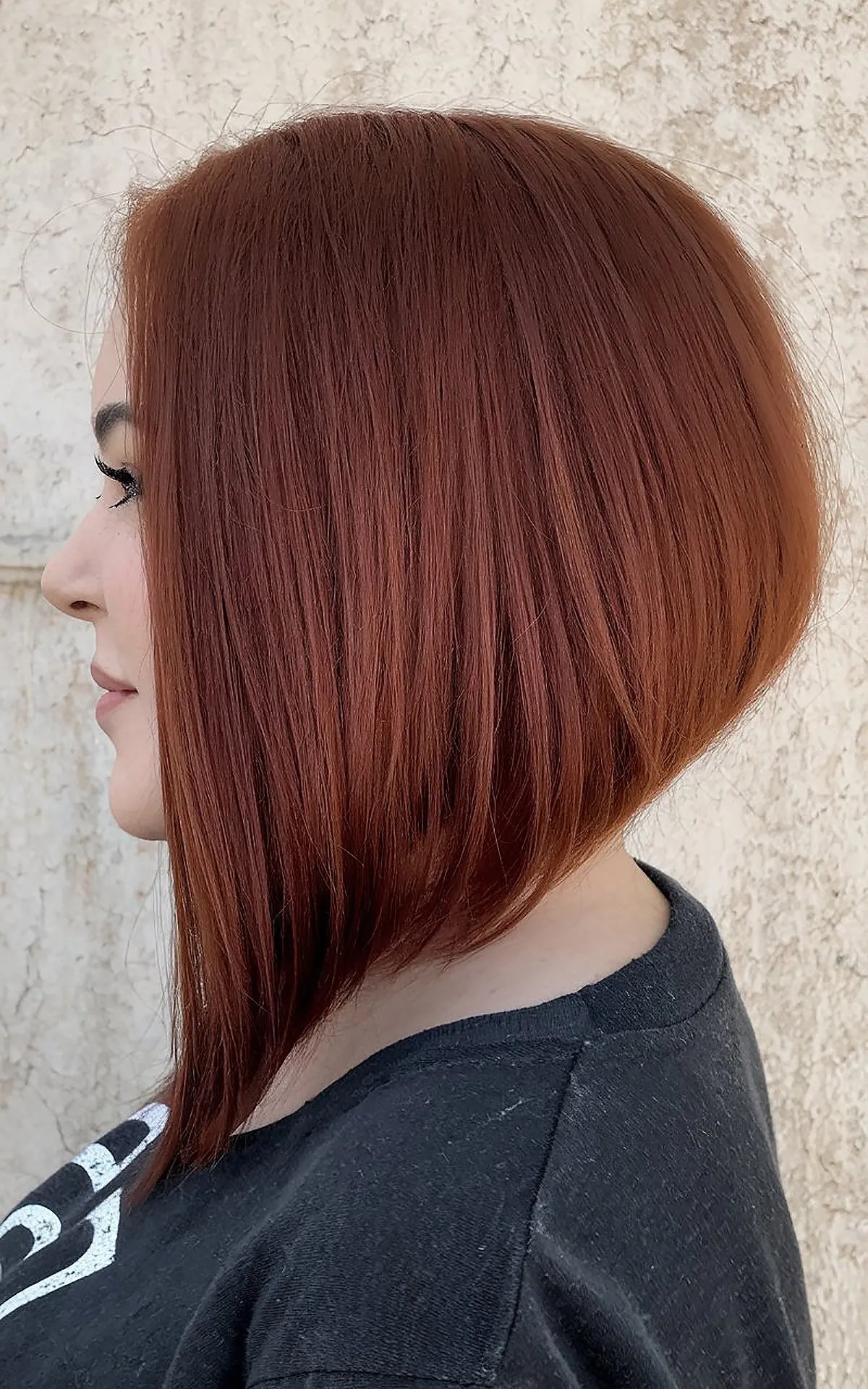 Auburn medium inverted bob haircut for women over 40