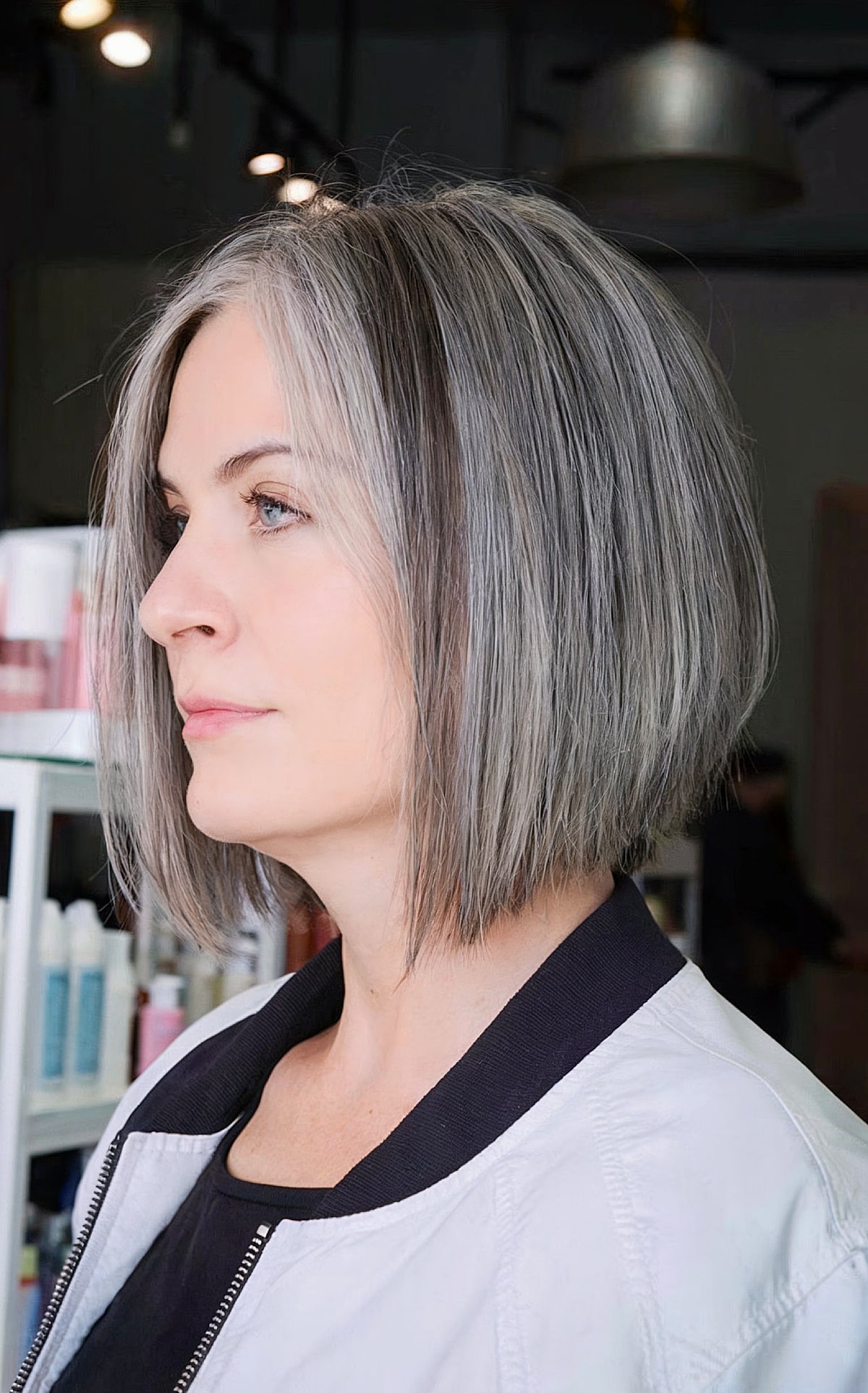 Crisp Angled Bob with Natural Color for older women embracing their aging hair