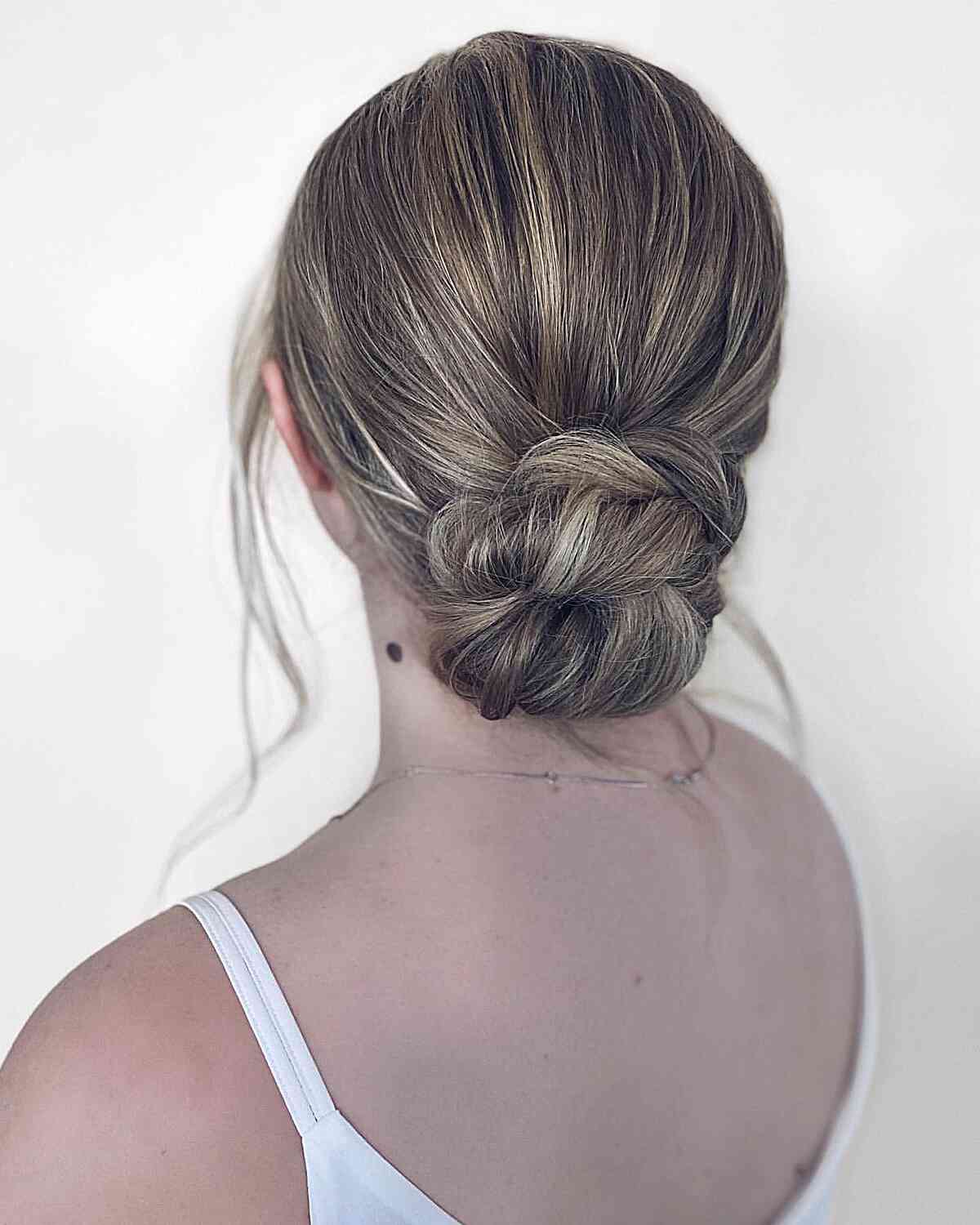 Dimensional Bridesmaid-Inspired Low Twisted Bun on Bronde Hair Easy Updo