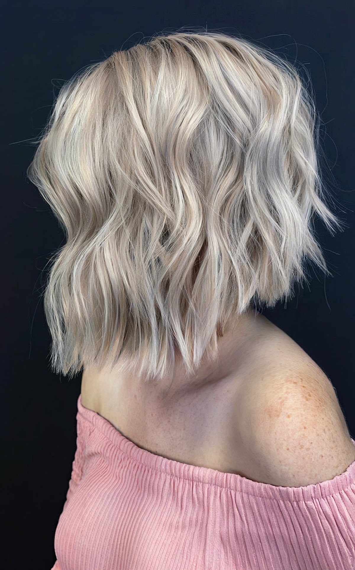 Dimensional long angled bob hairstyle
