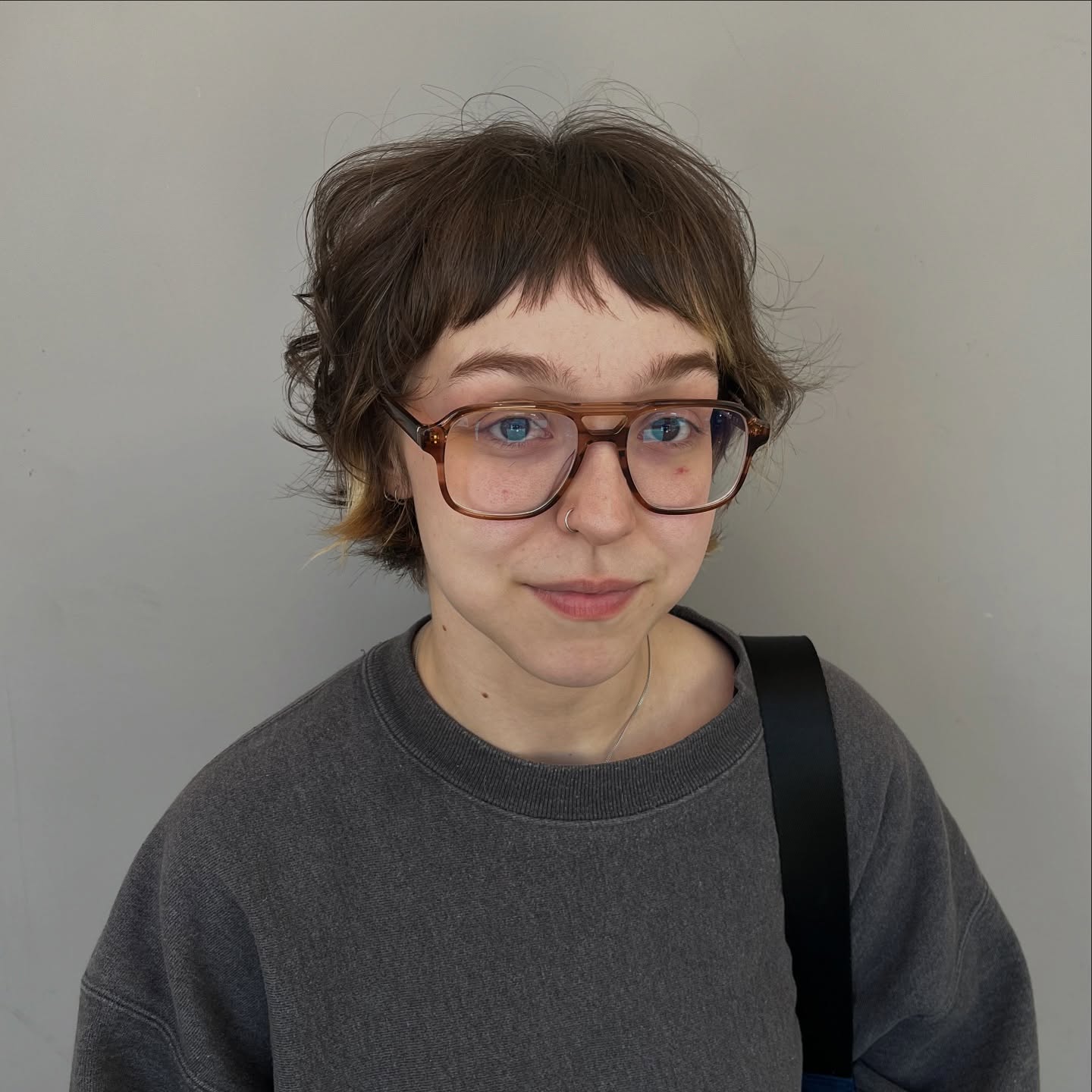 Playful Chestnut Shag with Wispy Bangs