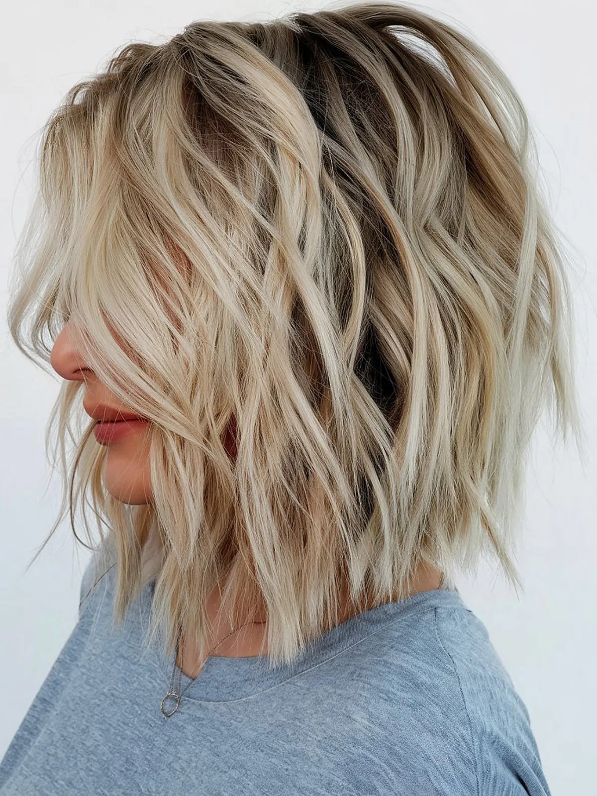 Shaggy shoulder length inverted bob cut