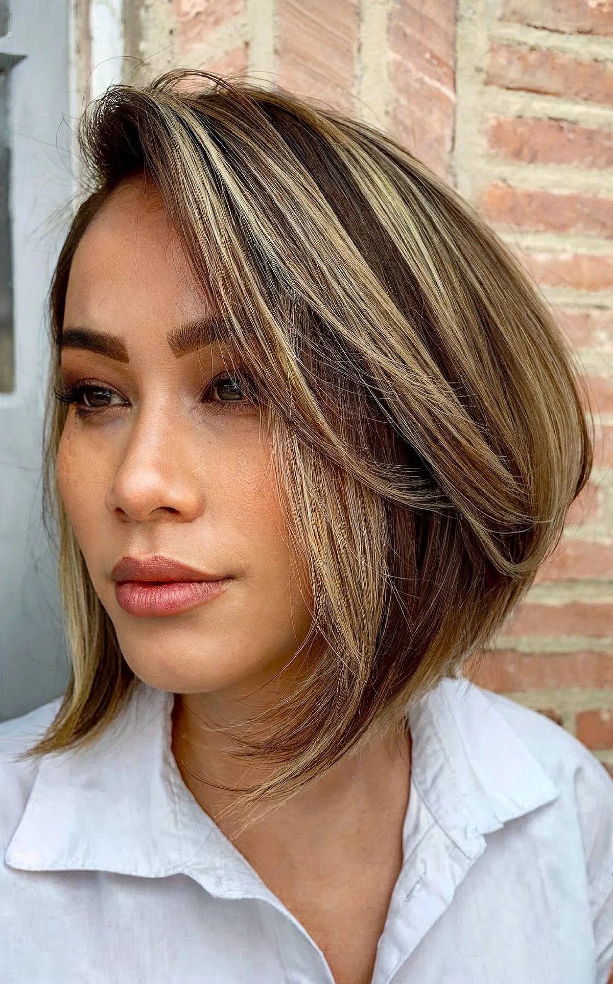 Short Side-Swept Angled Stacked Bob with Subtle Highlights