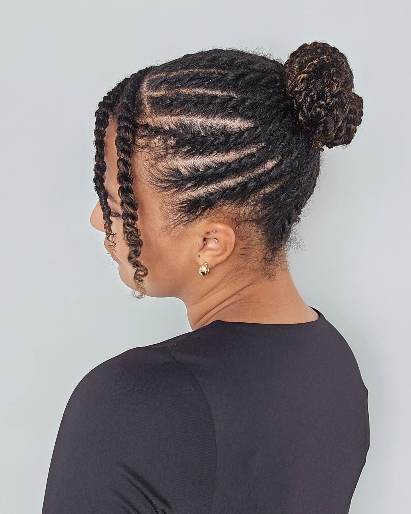 sleek flat twists with elegant bun