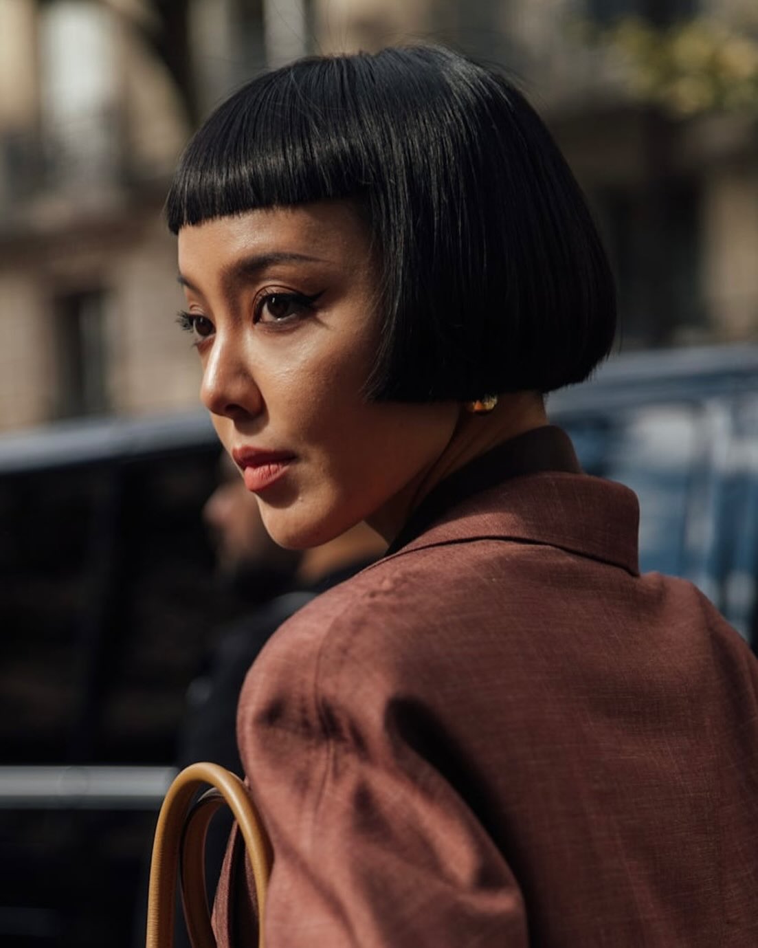 Sleek Jet-Black Bob with Precise Blunt Bangs